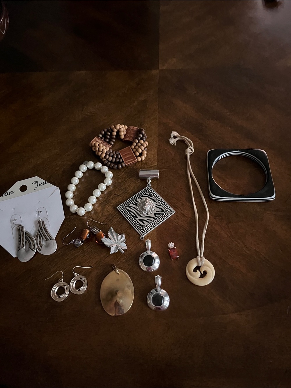 Assorted jewelry lot - pendants, bracelets, pierced earrings, bangle, brooch
